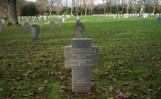 Photograph of three person marker at Sandweiler German War Cemetery.